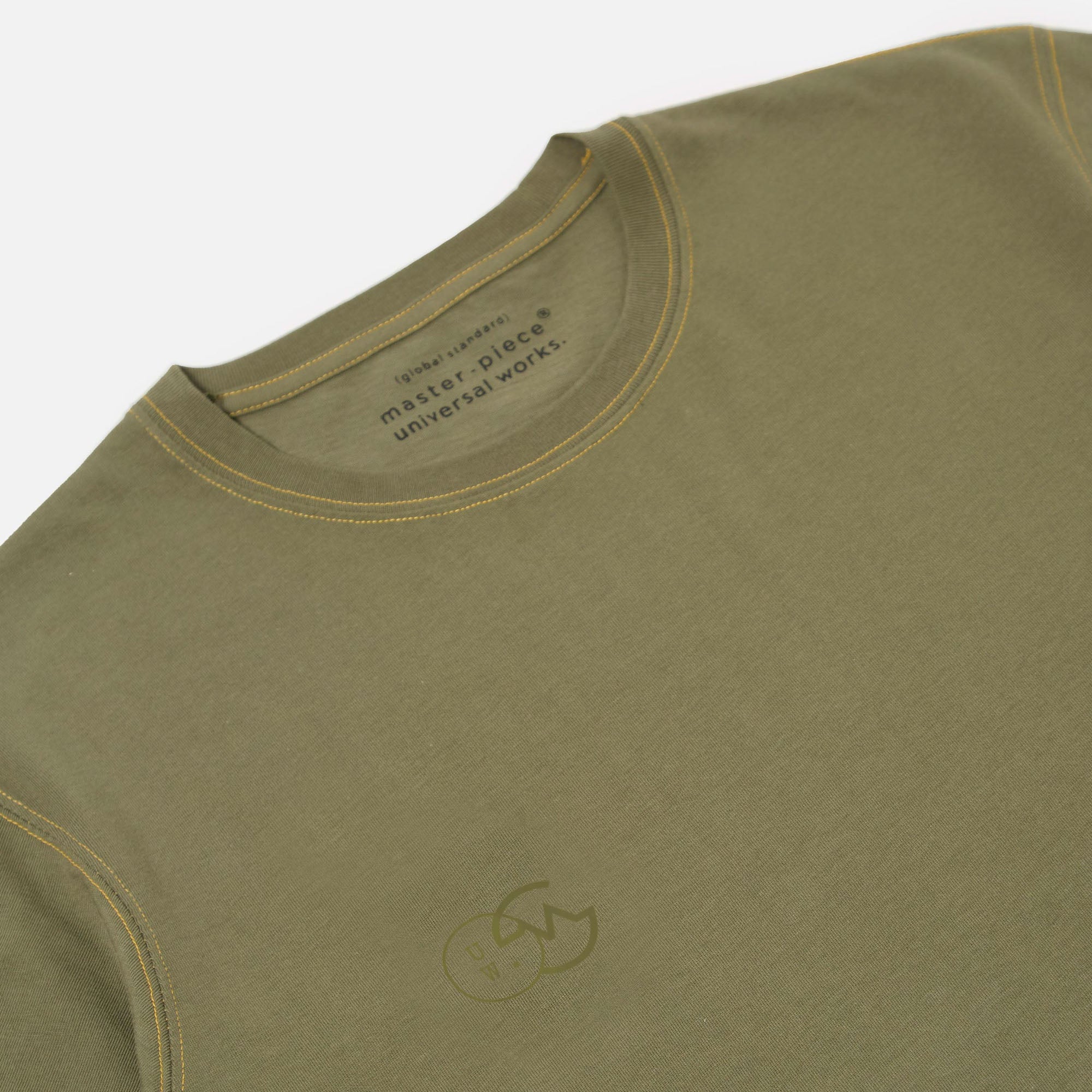 UNIVERSAL WORKS Master Piece Logo Print T-Shirt in Olive - Image 2